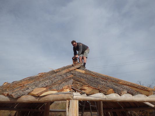 Cutting slabwood to fit angular roof.