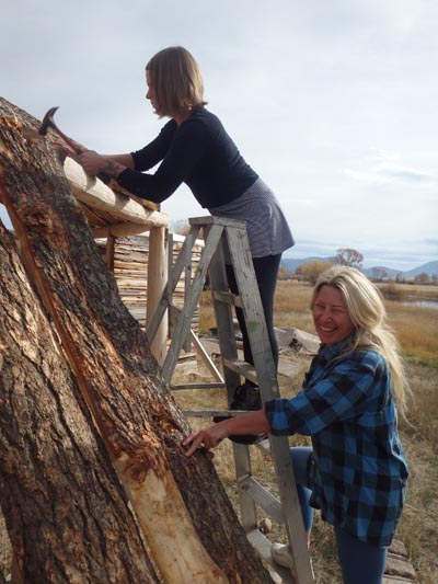 Constructing earthlodge walls.