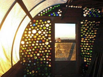 Light shines through a bottle wall.