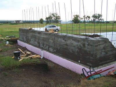 Concrete wall revealed.