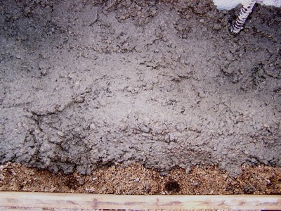 Slipform stone masonry close-up of concrete with sand method.