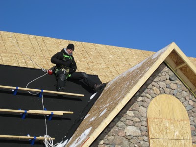 Roofing Prairie Stone Home.