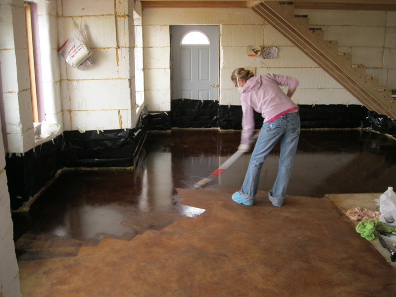 Staining the concrete floor.