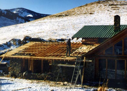 Roofing the addition.