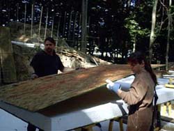 Rehl House: Preparing insulated wall panels.