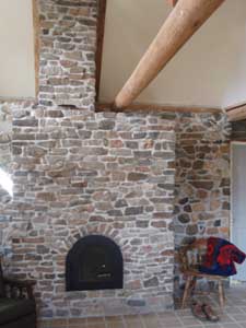 Door added to masonry fireplace.