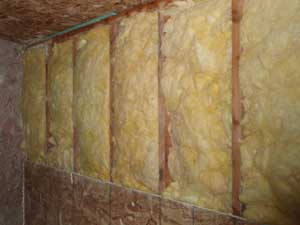 Framed and insulated walls inside garage.